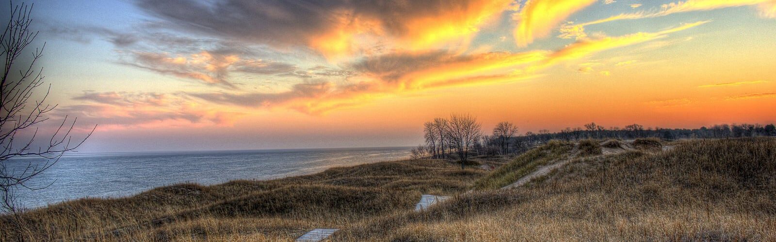 The sun setting over Lake Michigan as seen from Kohler-Andre State Park.