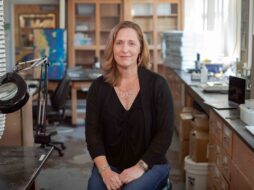Andrea Dutton sitting in her lab.